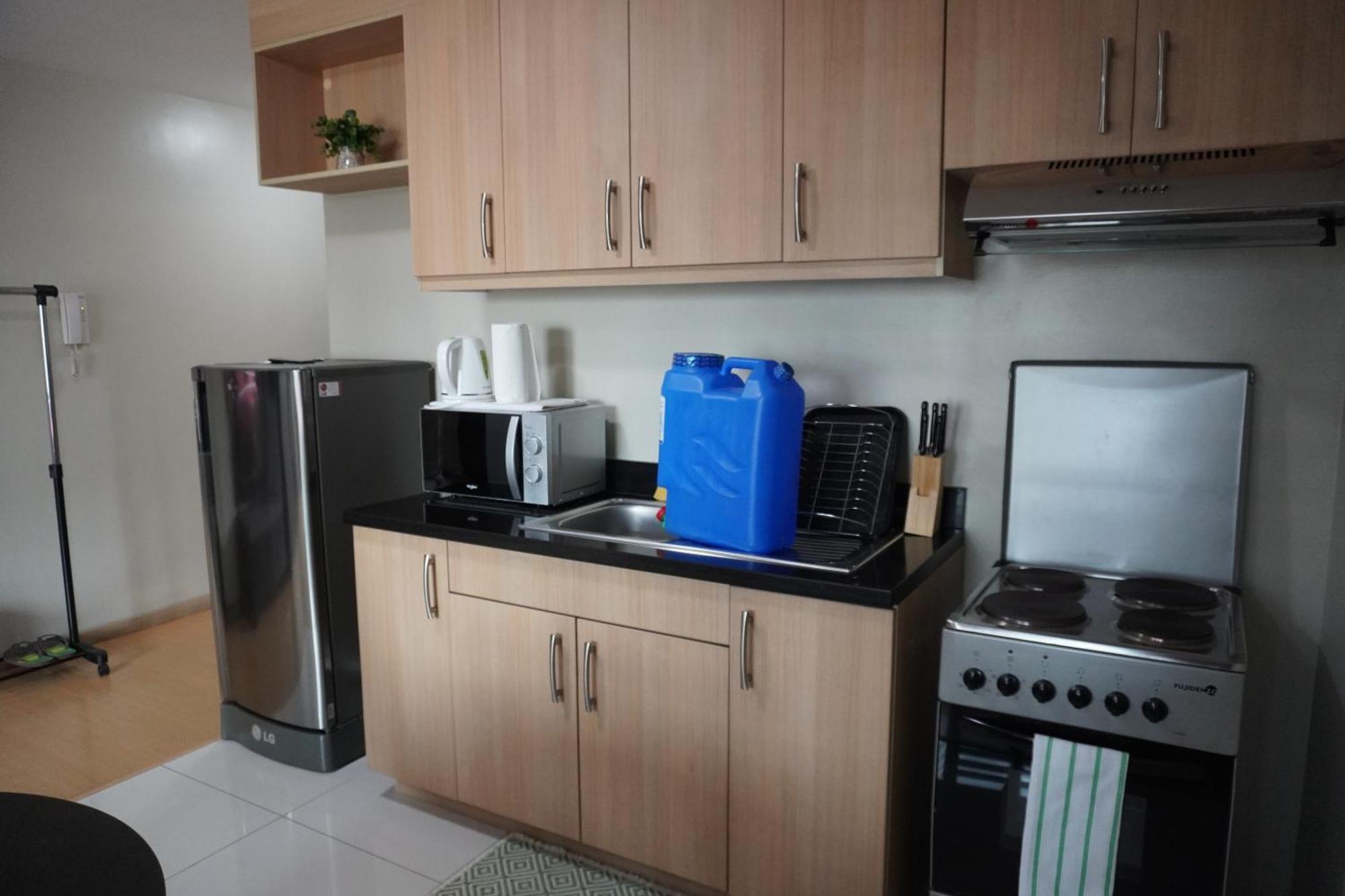Avant Apartments At The Fort Тагіг Номер фото