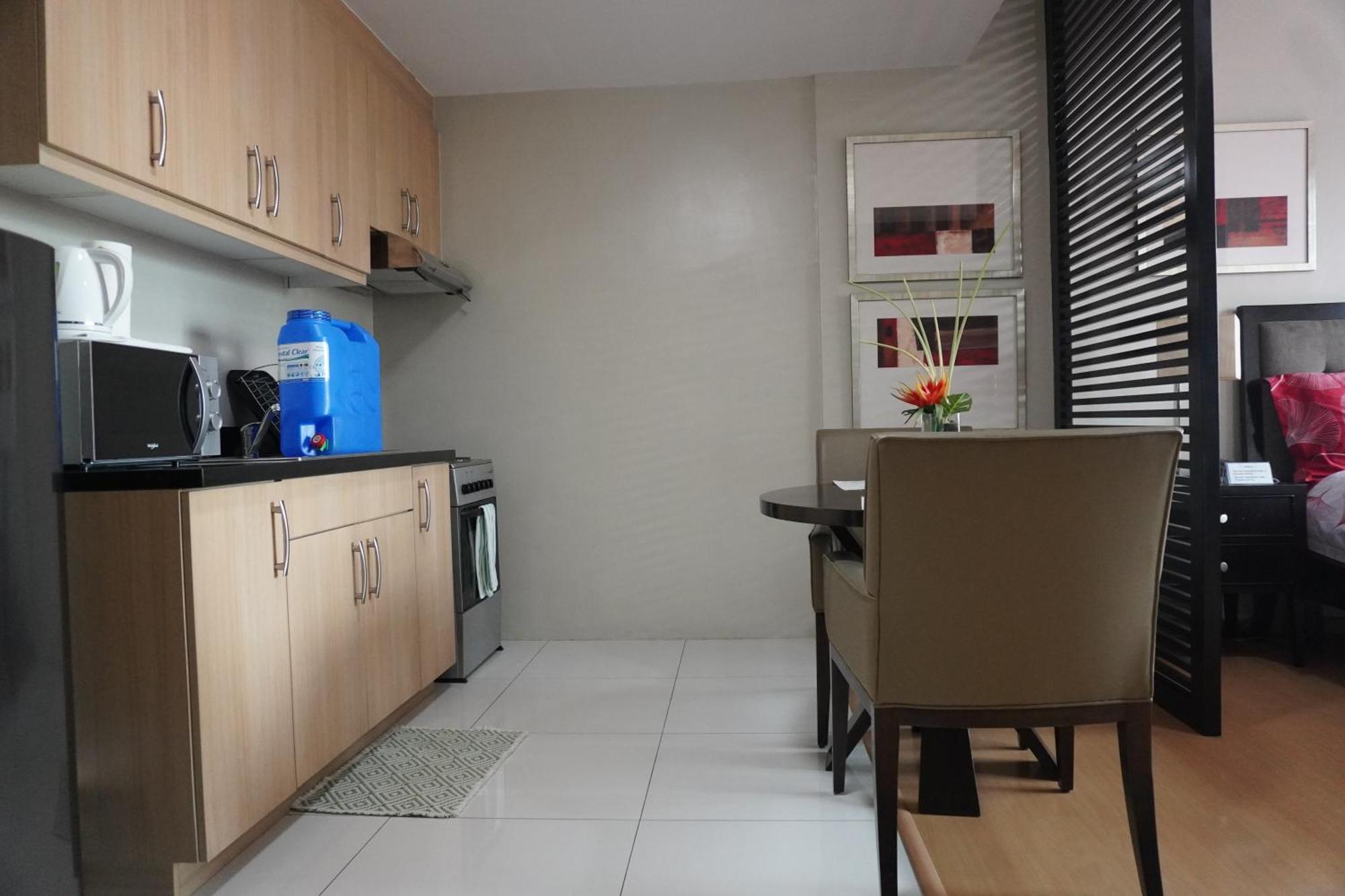 Avant Apartments At The Fort Тагіг Номер фото